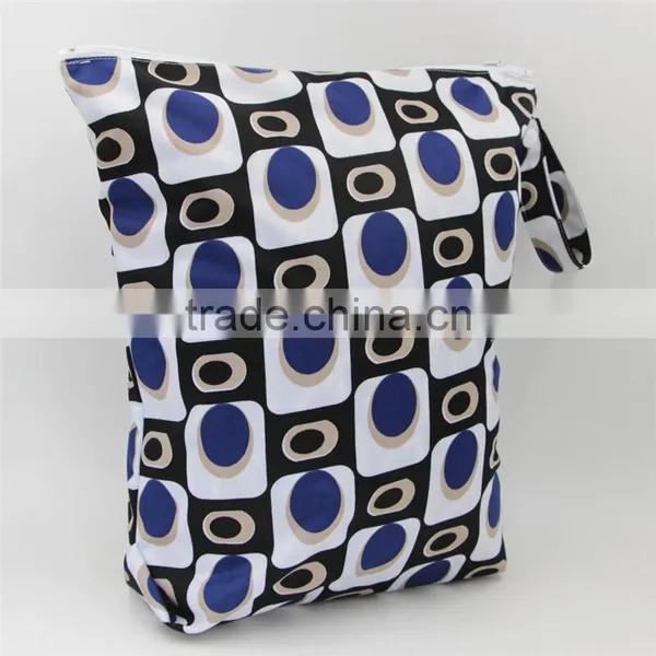 Free Sample Two Pockets Printed Patterns Cloth Diaper Wetbag for Baby Snap Handle Mummy Bag photo-2
