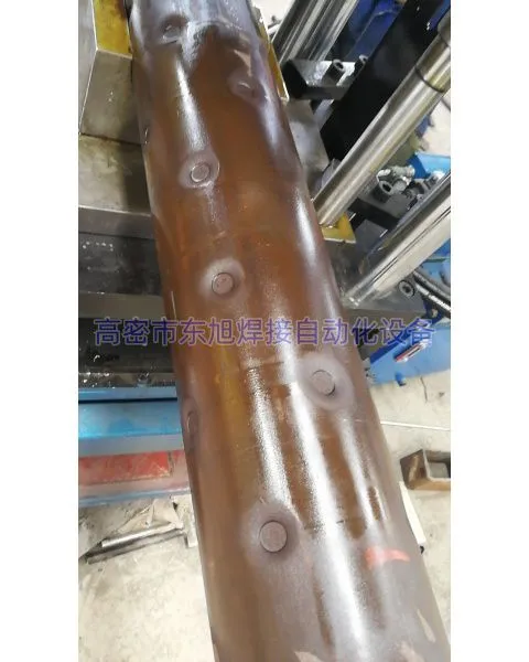 Customizable spacing reinforcement multi-head row welding machine