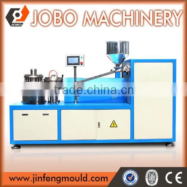 Cap dropping machine