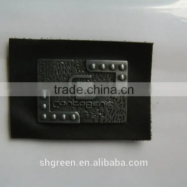 Shiny Golden Color Metal Badge on Black Leather photo-5
