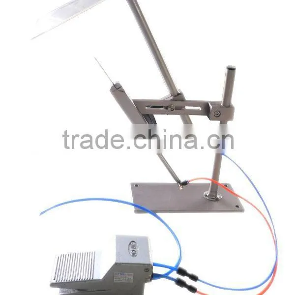 SAGA TM-100 Attaching Machine