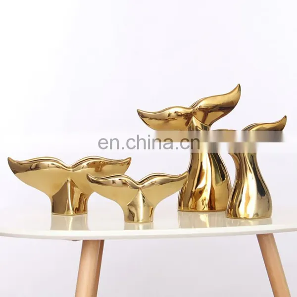 Ceramic Artwork of Golden Whale Tail Ornaments