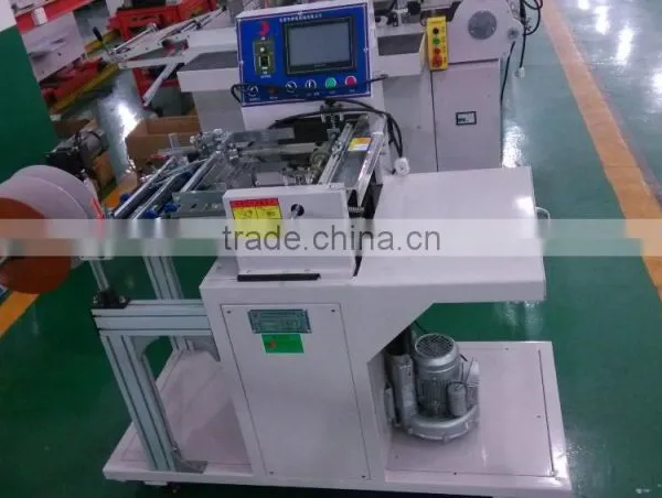 Aotomatic Adhesive Tape Roll to Sheet Cutting Machine photo-4