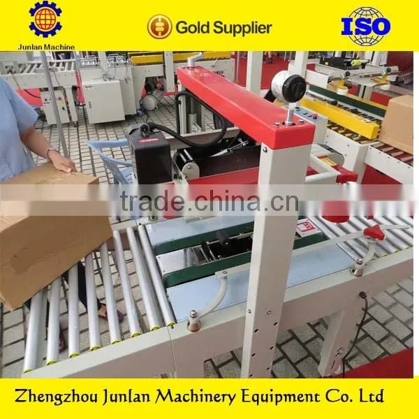 adhesive tape carton sealing machine