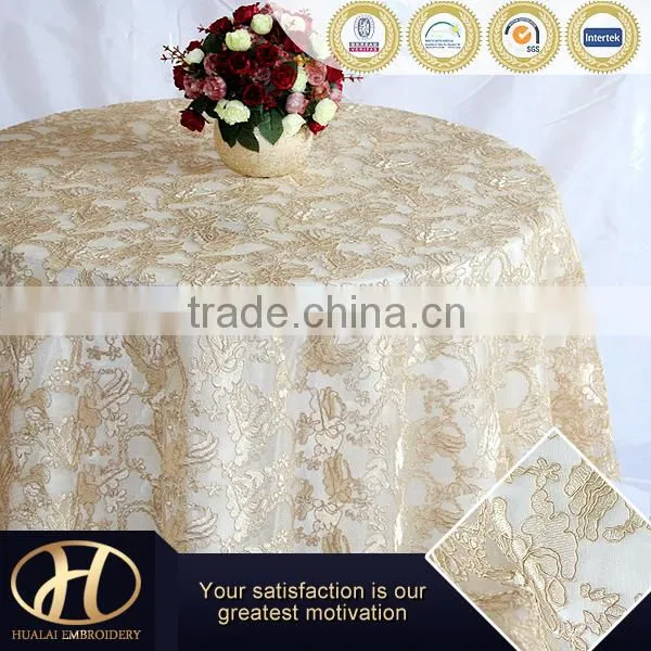 132" R CHAMPAGNE EMB TABLE CLOTH ON MESH