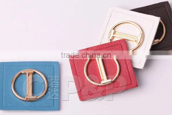 Delicate Metal Label Branded Leather Patch in Garment photo-2