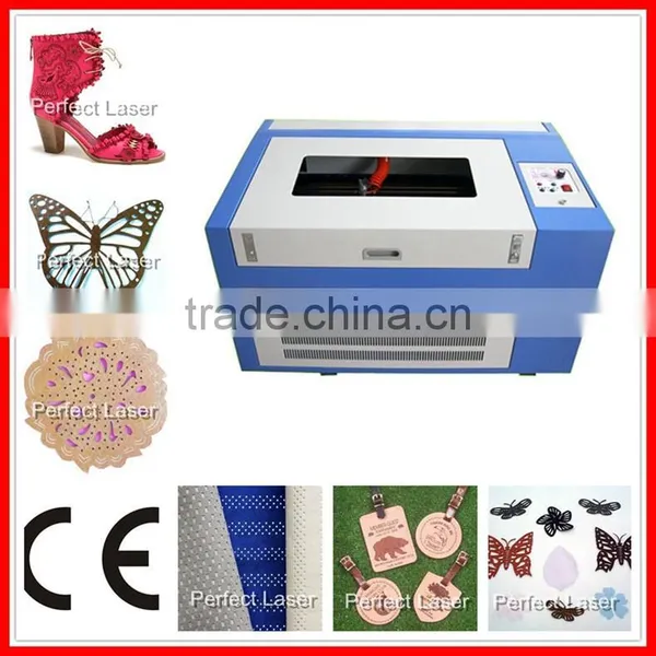 2015 China Machiney New Product Wood Acrylic Leather Rubber Stone Plastic Table Top Laser Cutter