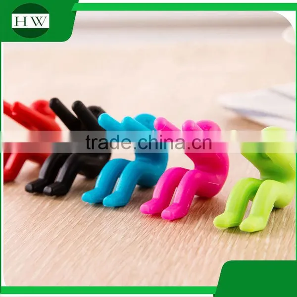 Multipurpose Eco Silicone Person Phone Tableware Raise up Anti Overflow Pot Lid Holder photo-4