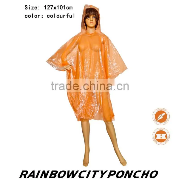 PE Rainponcho Orange Color Within Paper Card in the Packing Zipper Bag