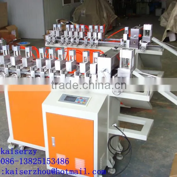 Full Automatic Curtain Eyelet Punching Machine photo-3