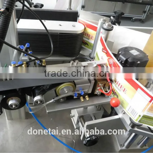 Automatic Lubricating Oil Bottle Labeler photo-5