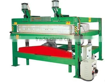 MATTRESS COMPRESS AND PACKING MACHINE