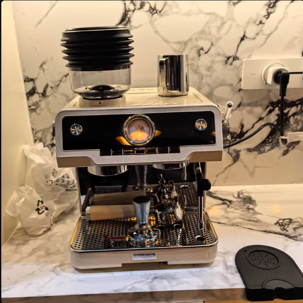 Coffee Maker with Built-in Grinder and Adjustable Brew Strength