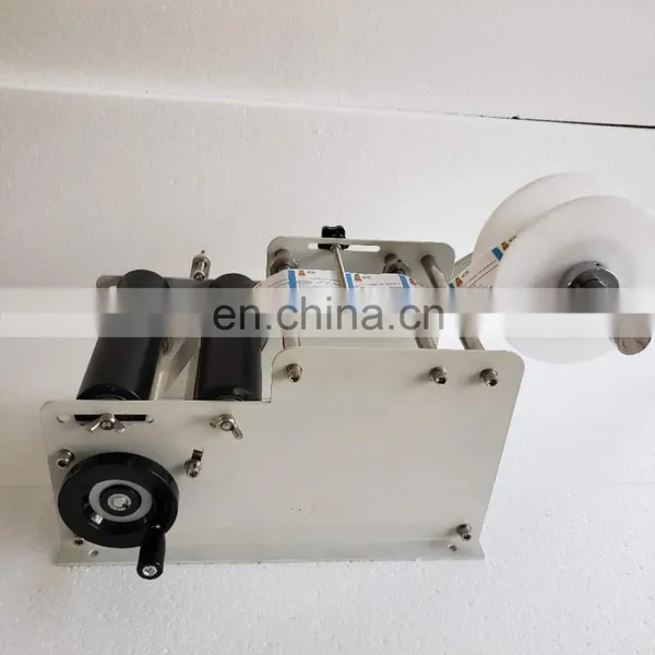YTK-100 Factory Price Manual Labeling Machine for Round Bottle photo-2
