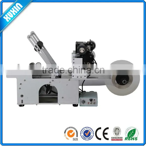 Semi-automatic round bottle labeling machine X-90