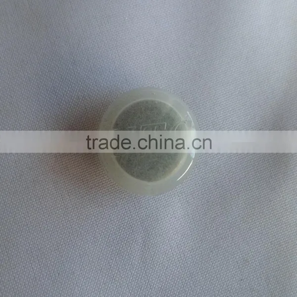 Metal Transparent Plastic Garments Button in Stock photo-3