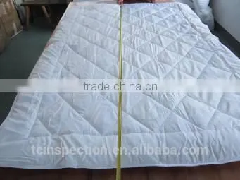 Quilt and Pillow Inspection Service photo-3