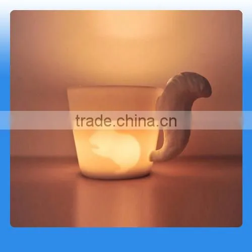 Decorative Ceramic White Mug With the Squirrel's Tail Shaped Handle photo-4