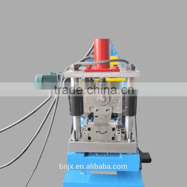 Rolling shutter door forming machine