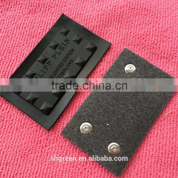 Shiny Golden Color Metal Badge on Black Leather photo-3