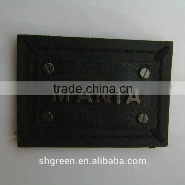 Shiny Golden Color Metal Badge on Black Leather photo-6