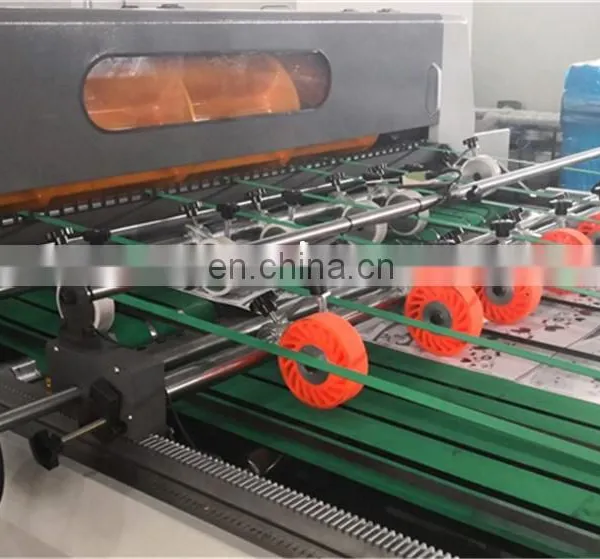 UCM1900A High Speed 4 Roll Automatic Paper Cutting Slitting Machine With Conveyor Belt Stacker photo-2