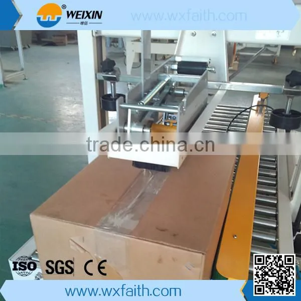 Top and bottom carton packing machine