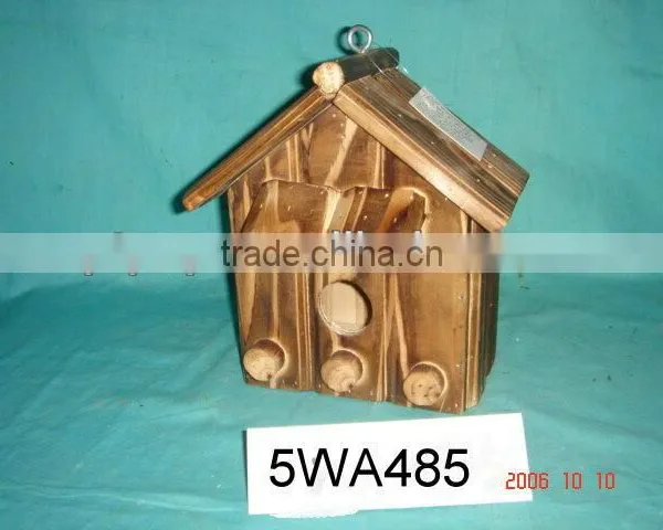 burned wooden bird house