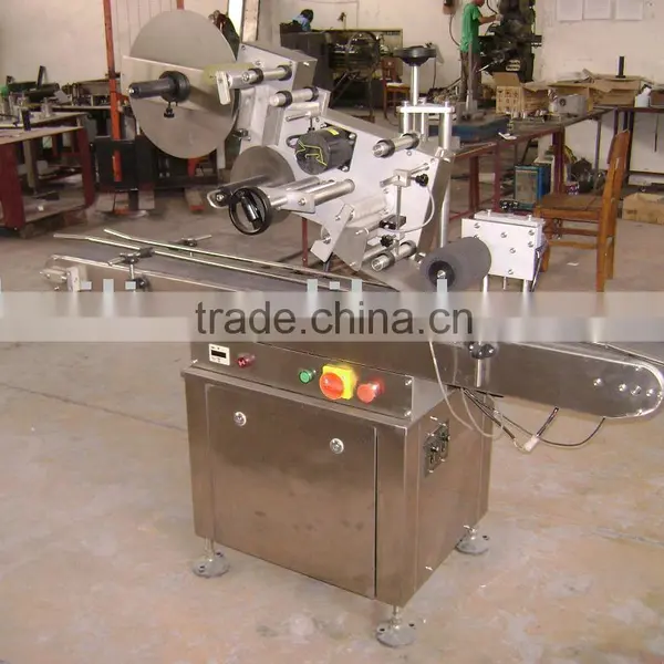 labeling machine ,adhesive labeling machine , bottle labeling machine
