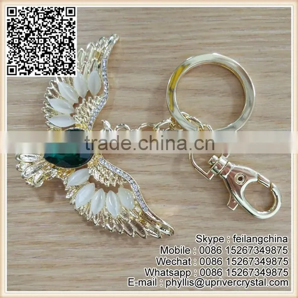 White Diamond Rhinestone And Huge Dark Green Crystal Eagl Keychain photo-2