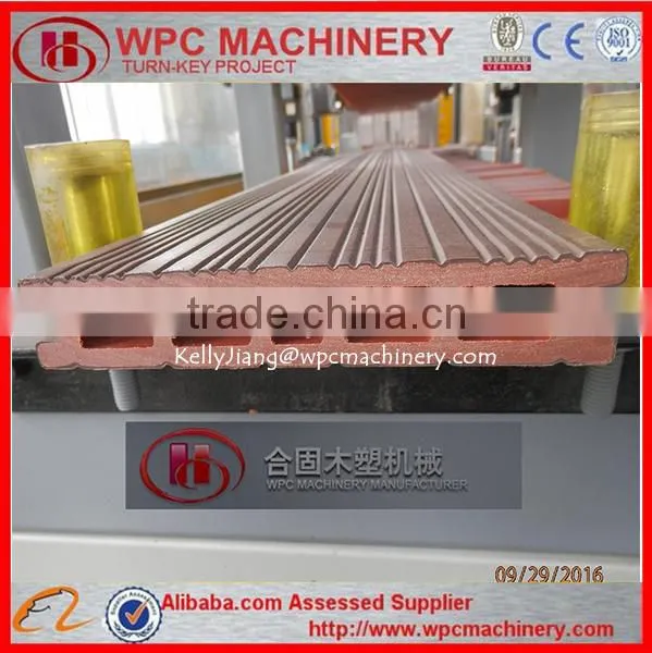 WPC Wood Plastic PVC Co-extrusion Flooring Machinery photo-6