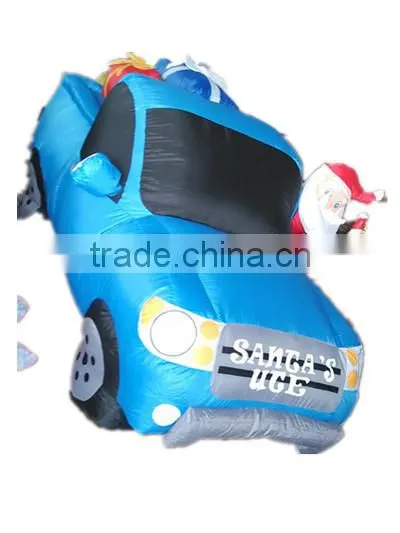 Santa Claus With Gift Boxes in Inflatable Truck Outdoor