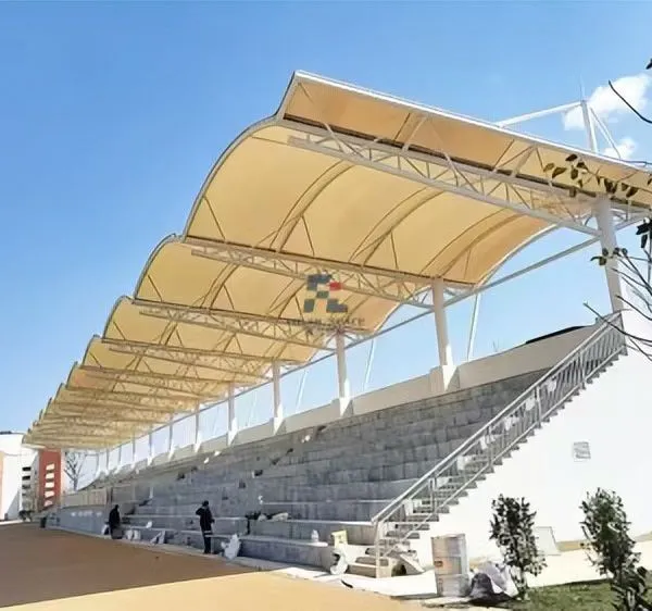 Stadium Grandstand Tensile Fabric Canopy Cover – PTFE Membrane with Curved Steel Frame for Football Field Bleacher Roof