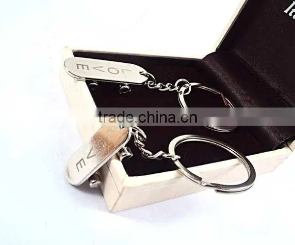 Promotional Items Custom Logo Metal Skateboard Keychains photo-3