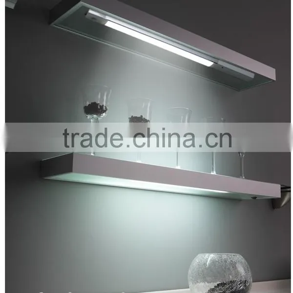 Under-cupboard LED fixture with motion sensor