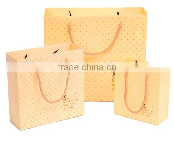 Fancy Folded Die Cut Handle Offset Printing Kraft Paper Bag photo-3