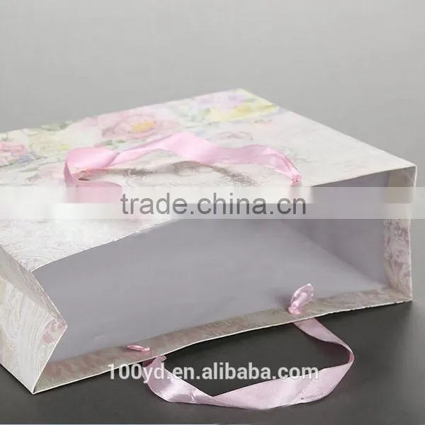 New Fashion Pre Coating Door Gift Luxury and Fashion Paper Bag for Printing photo-2