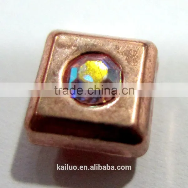 bright copper color rivet with colorful A stone