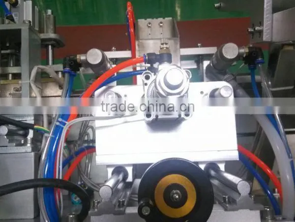 China Guangzhou GMP Standard Double Head Face Mask Making Machine photo-4