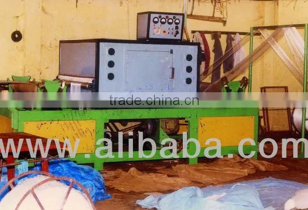 LENGTH WAY STRETCHING MACHINE FOR HEAT SETTING OF FISHING NETS.