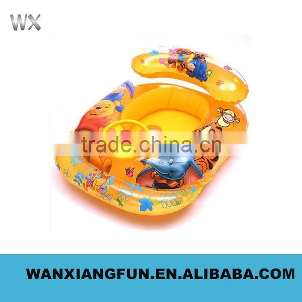 Baby Using Inflatable Swim Boat photo-3