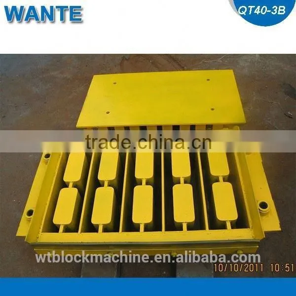 2014 Top Quality!!! Small Soil Cement Manual Mobile Interlocking Hollow Block Machine Price in Stock QMR2-40 photo-3