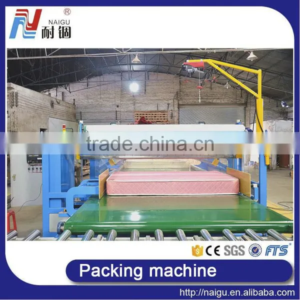 China NaiGu Factory Manufacture Mattress Automatic Film Packaging Machine photo-6