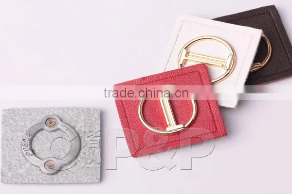 Delicate Metal Label Branded Leather Patch in Garment photo-4