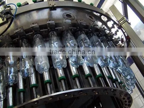 Automatic Rotary (station) Bottle Rinsing Filling & Capping Machine photo-2