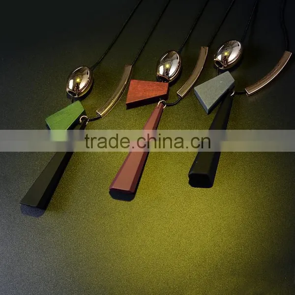 Geometric Wood Bead Pendant Necklace Gold Curved Tube Bead Black Chain Necklace Geomotric Rubber Pendant Long Sweater Necklace photo-2