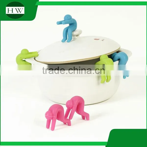 Multipurpose Eco Silicone Person Phone Tableware Raise up Anti Overflow Pot Lid Holder photo-3