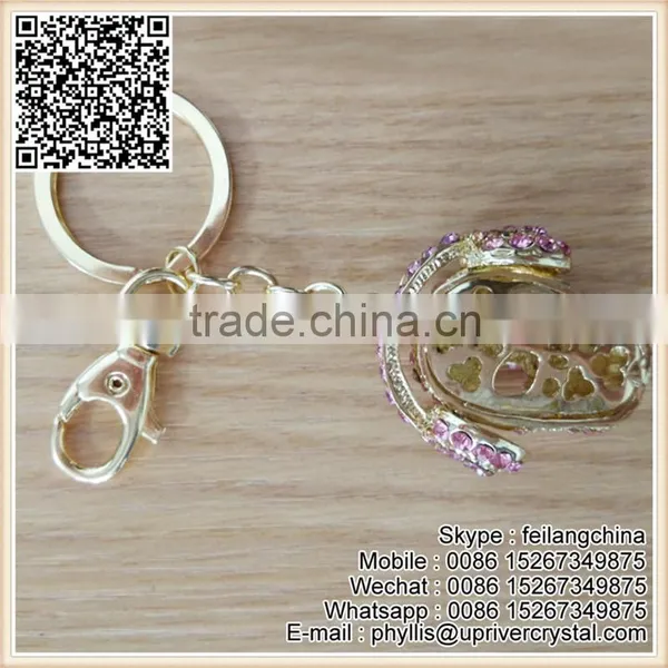 Promontion Cheap Pink Crystal Golden Metal Skull Wearing Headset Keychain photo-3