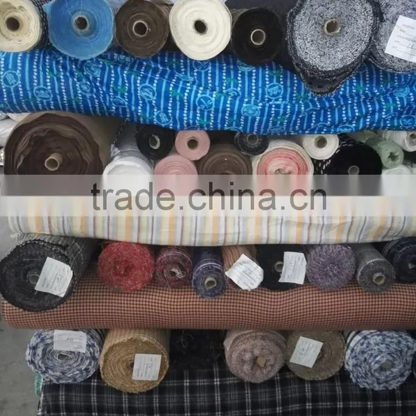 Small Rolls Stocklot Fabric of Garment in Warehouse photo-2