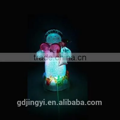 Holding a Red Heart Acrylic Snowman With LED Light photo-3